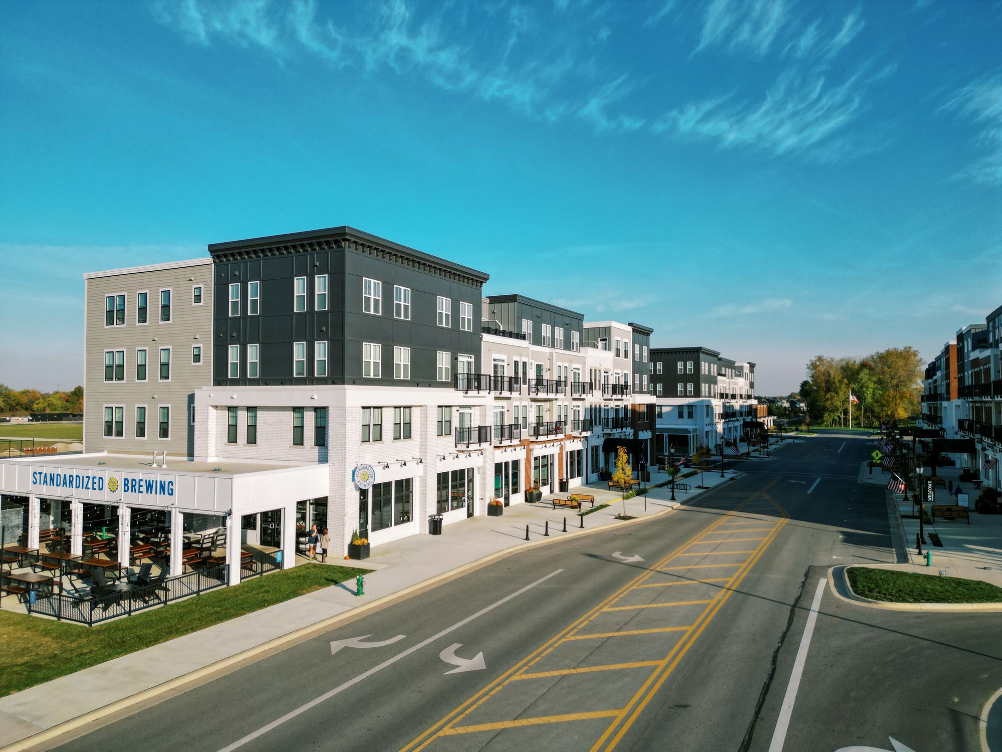 The Marketplace town center at Evans Farm, with shops, restaurants, and the brewery patio